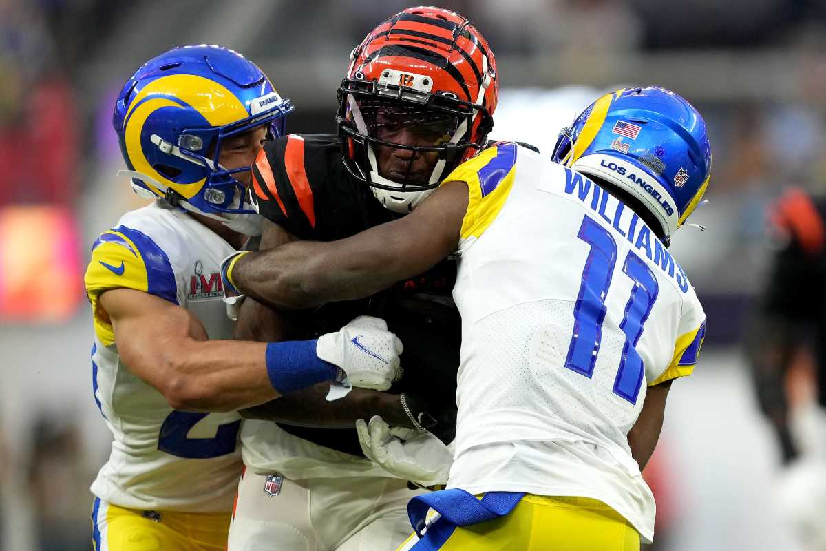 Cincinnati Bengals wide receiver Tee Higgins (85) competes for extra yardage after a catch as Los Angeles Rams cornerback Darious Williams (11) defends in the second quarter during Super Bowl 56, Sunday, Feb. 13, 2022, at SoFi Stadium in Inglewood, Calif. The Cincinnati Bengals lost, 23-30. Nfl Super Bowl 56 Los Angeles Rams Vs Cincinnati Bengals Feb 13 2022 1236